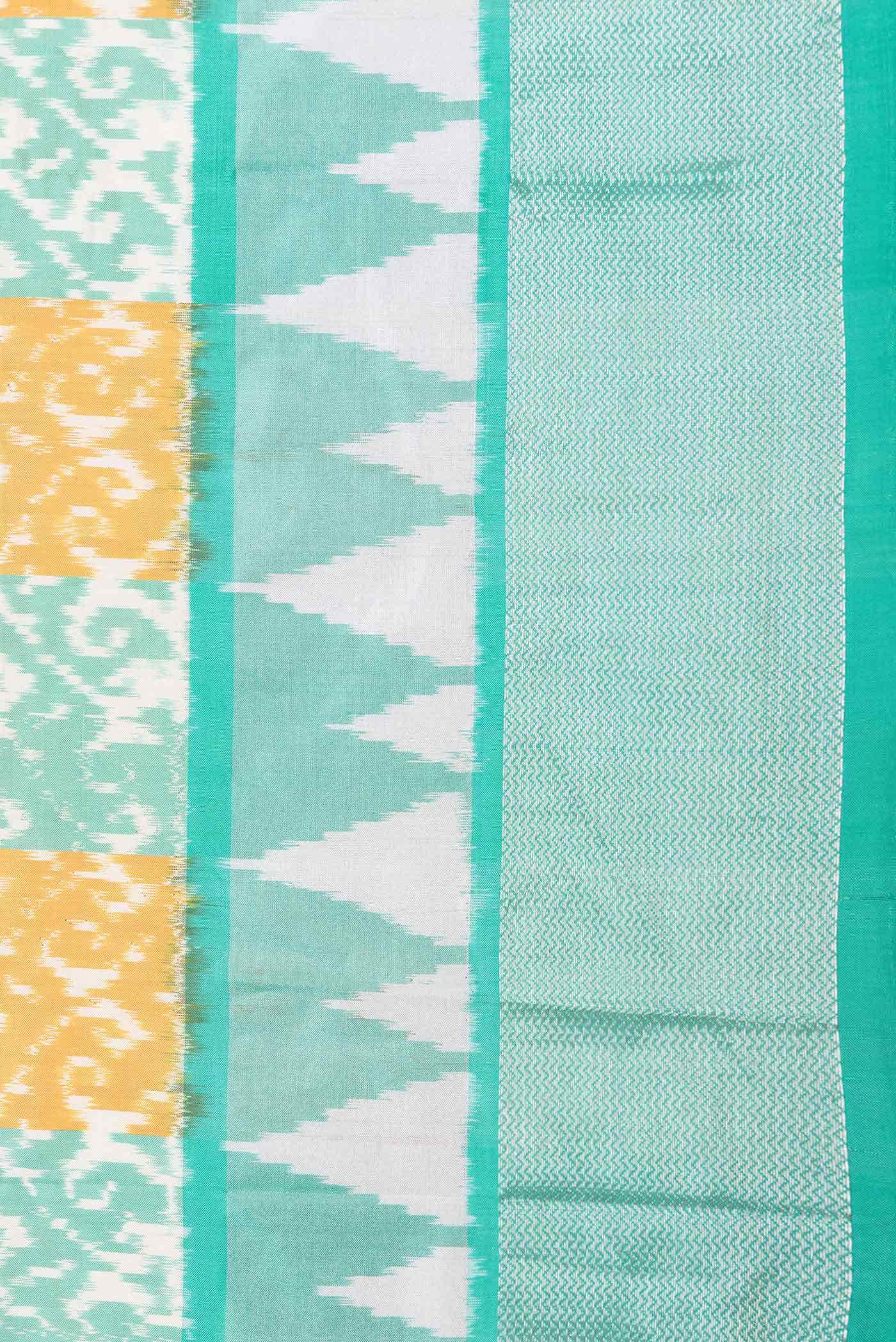 Mustard and Sea Green Dual Tone Double Ikat Saree