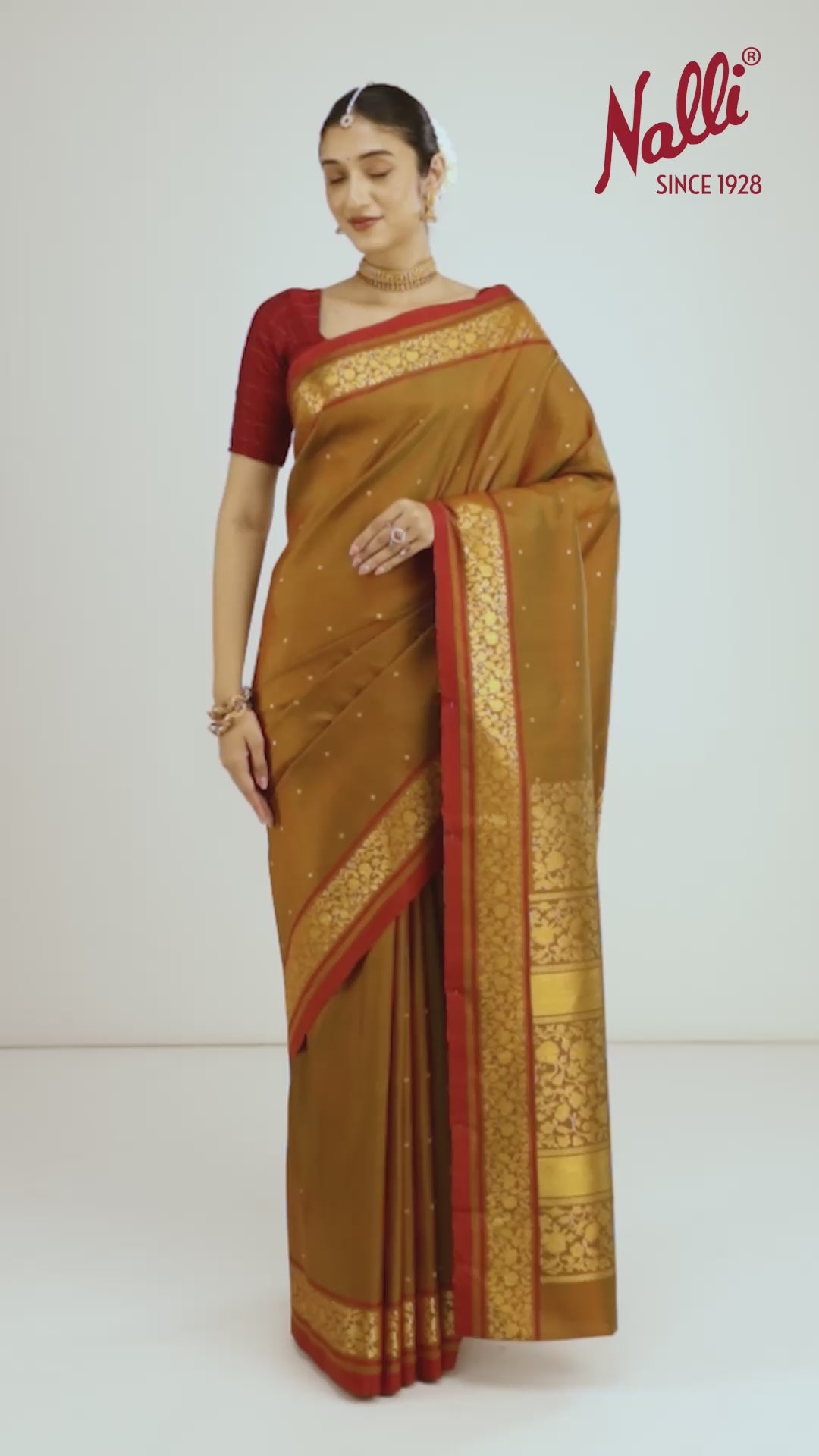 Raadhya-Pure Silk Orange-Green Kanchipuram Saree