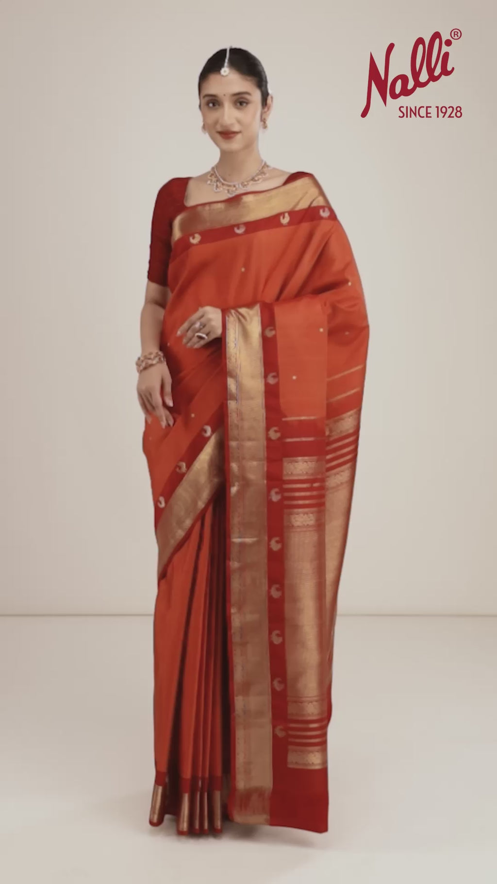 Leela-Pure Silk Rust Orange Kanchipuram Saree